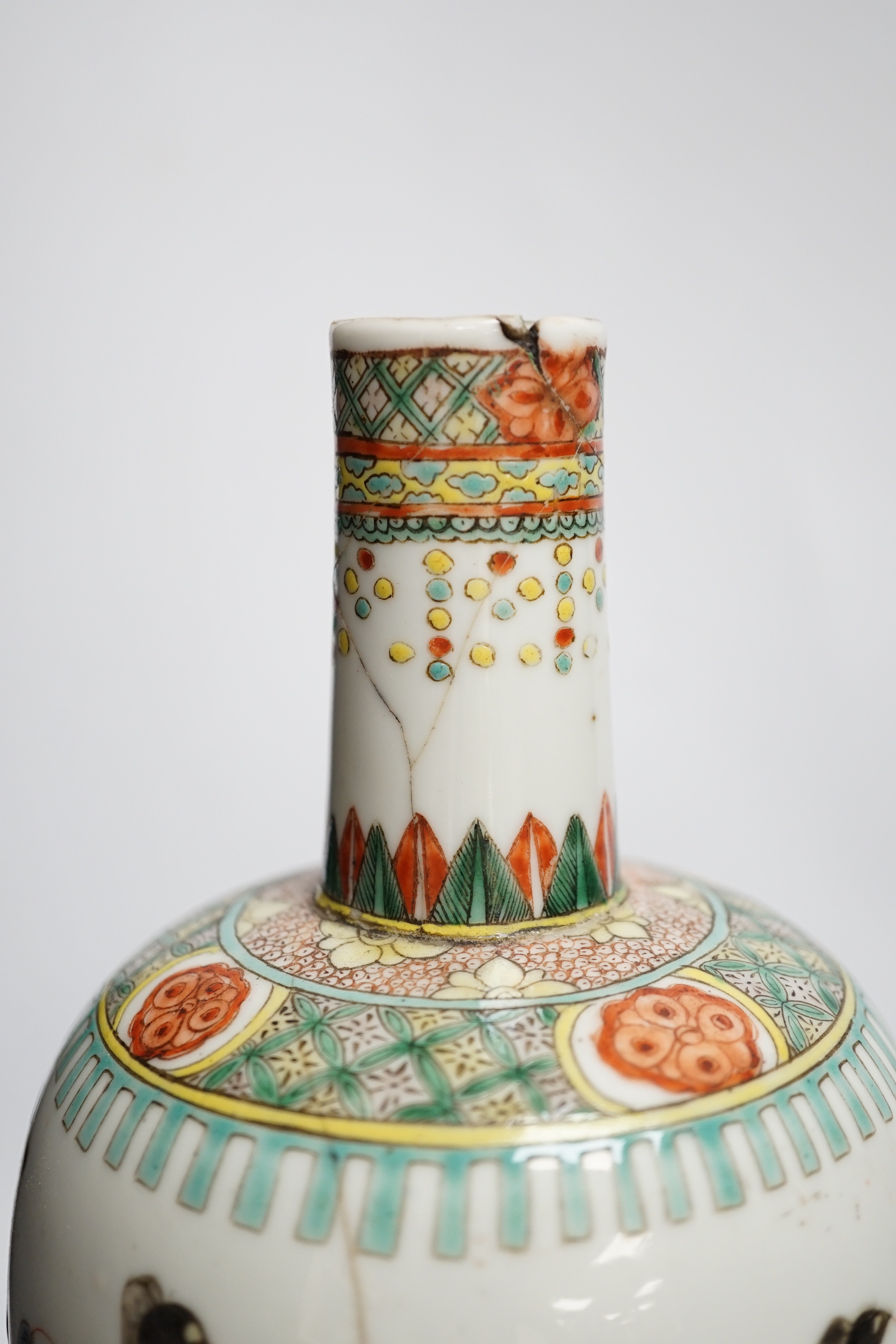 A Chinese famille verte ‘scholars’ vase and a Chinese powder blue bowl, both 19th century, vase, 32cm high